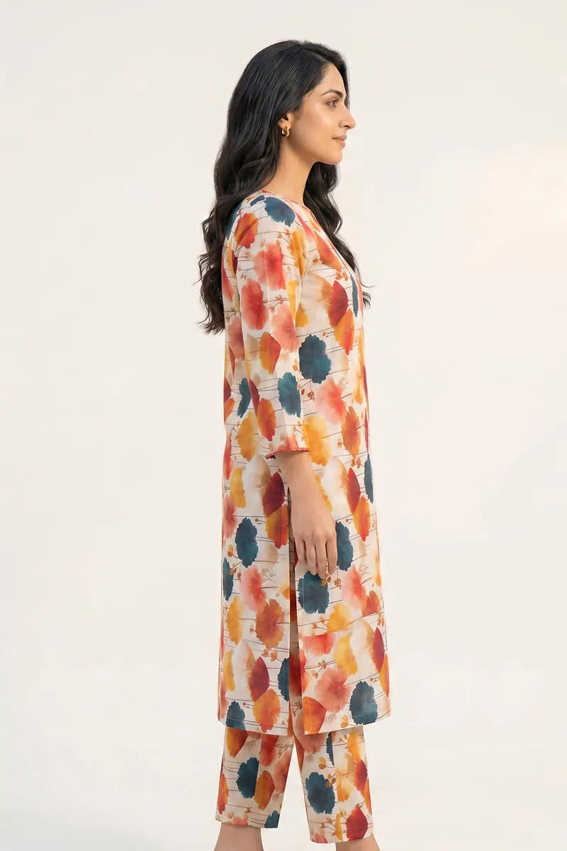 Side profile of the Saffron Breeze 2 piece printed lawn unstitched suit by Dorikhas, highlighting the allover floral pattern and trouser fit.
