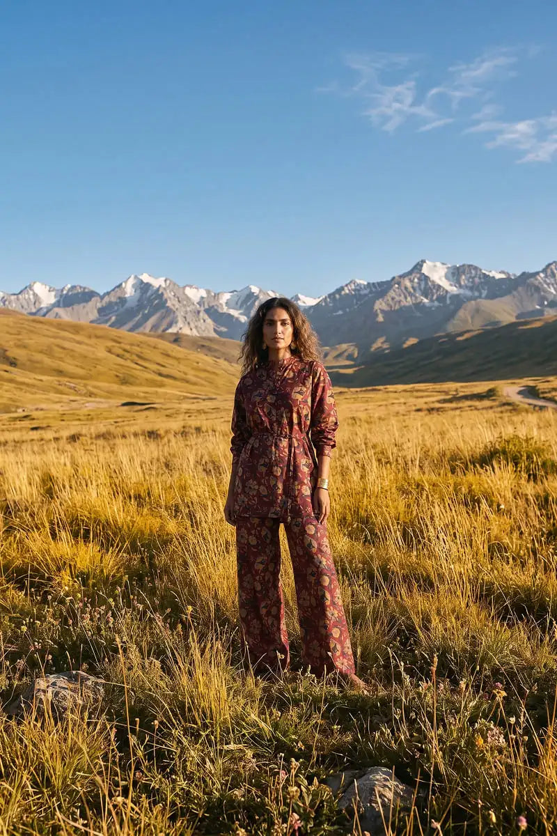 Full-length shot of Garnet Bloom 2 piece maroon allover printed lawn suit by Dorikhas Pakistan.