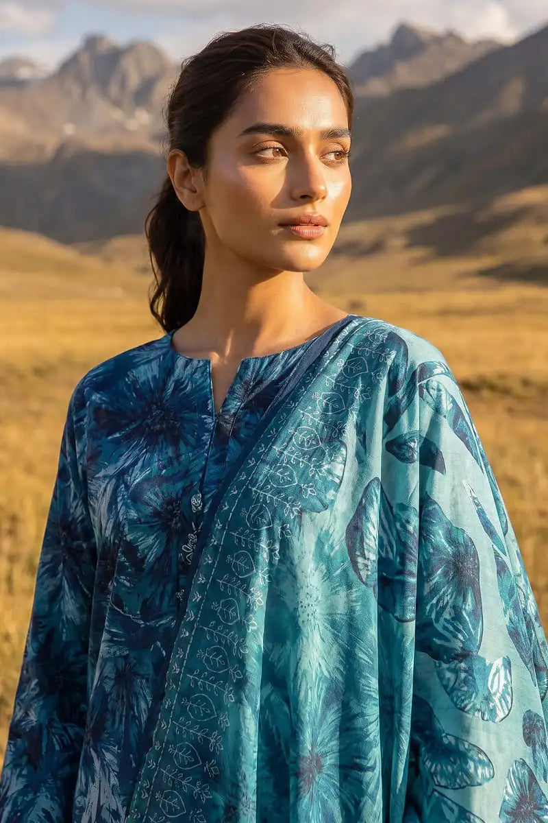 Close-up shot of model wearing Oceanic Mirage 3 piece printed lawn suit with dupatta by Dorikhas Pakistan.