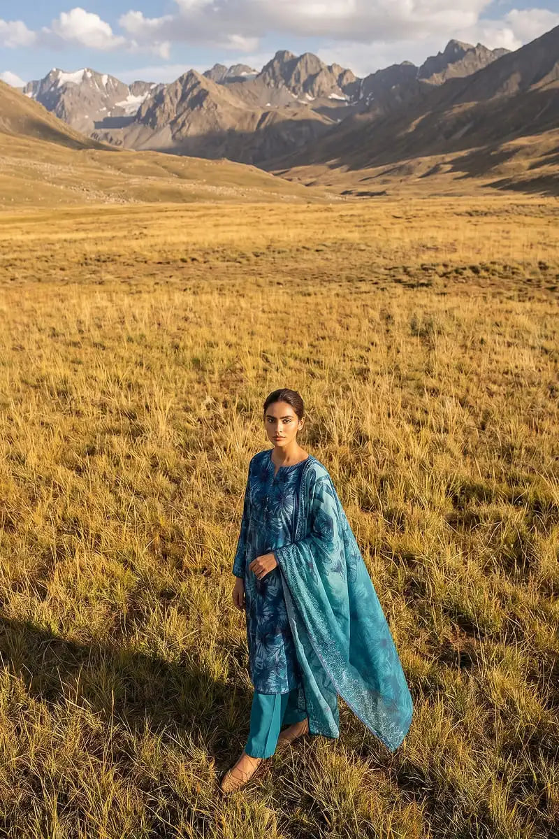Full-length landscape shot of Oceanic Mirage 3 piece teal blue printed lawn suit by Dorikhas Pakistan.