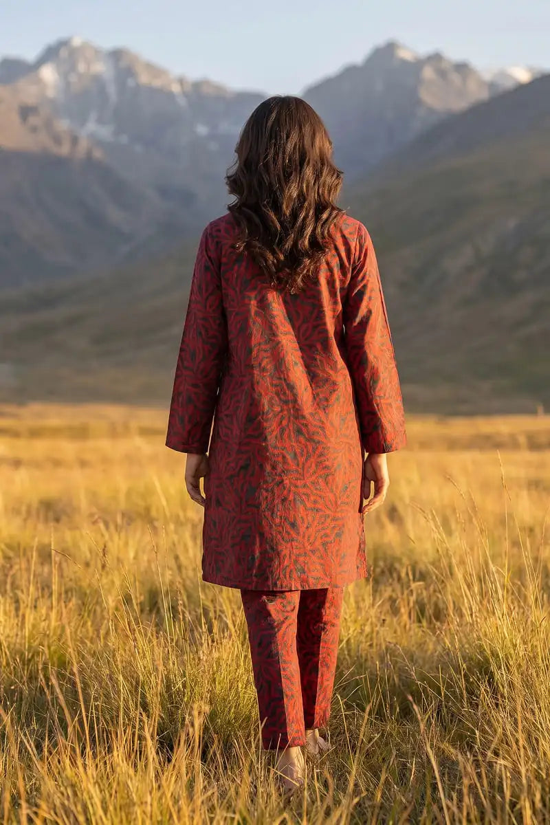 Back view of model wearing Coral Maze 2 piece unstitched allover printed lawn suit by Dorikhas Pakistan.